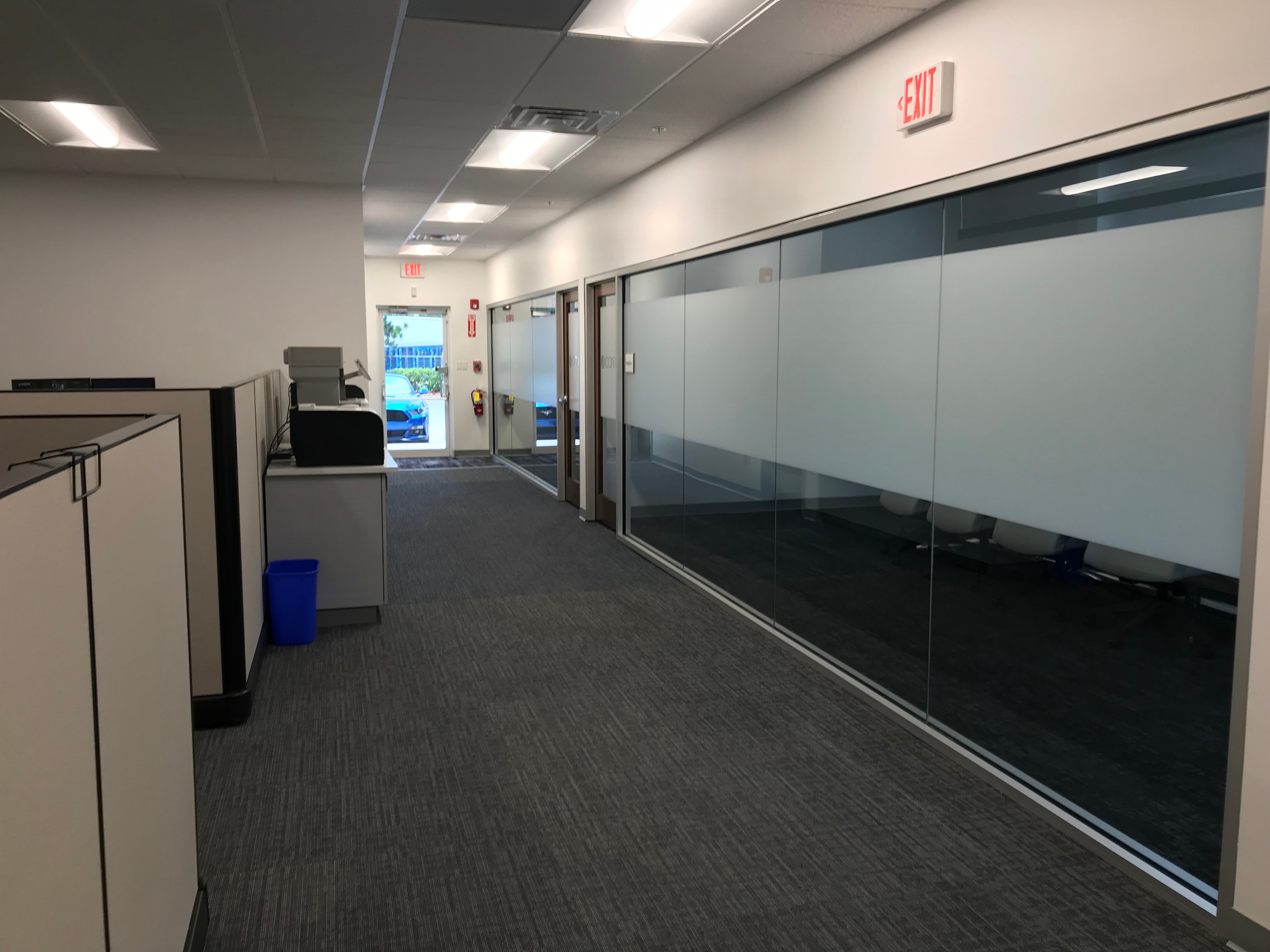 Office with reduced glare from window film